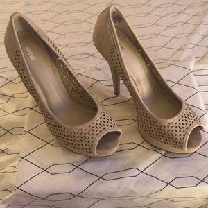 Nude/tan high heels.